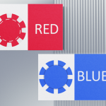 Red and blue playing cards with matching poker chips representing the Red/Blue negotiation game.