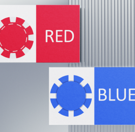 Red and blue playing cards with matching poker chips representing the Red/Blue negotiation game.